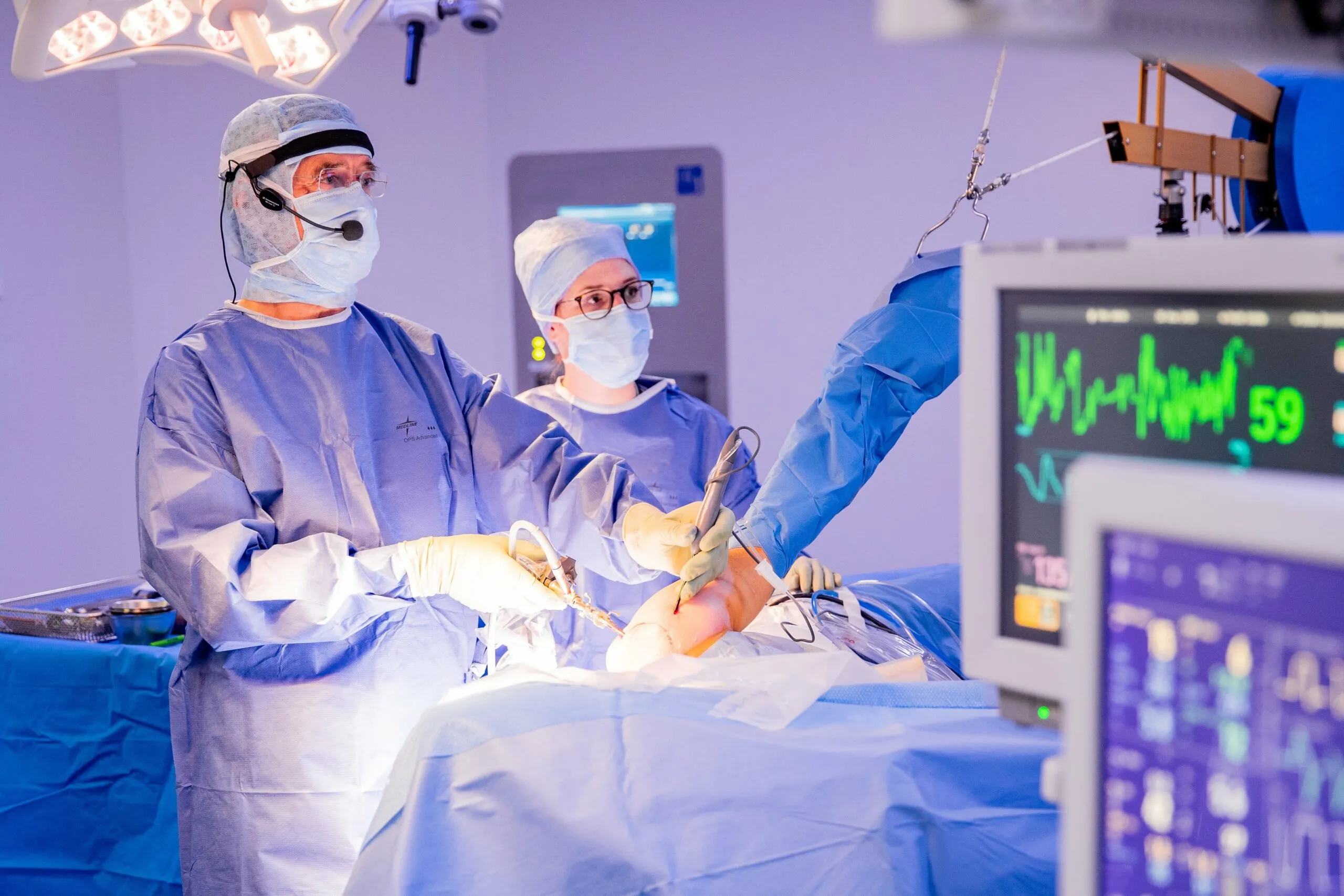 Dr Gazielly in the operating theatre, performing an arthroscopic rotator cuff repair